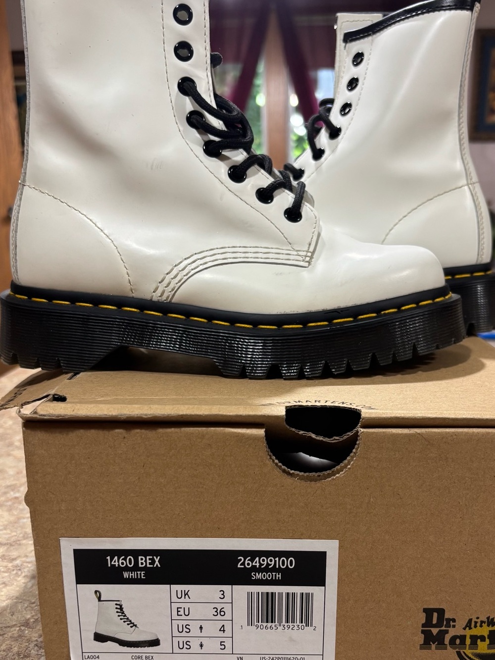 Dr. Martens White Lace-Up Platform Boots with Black Sole